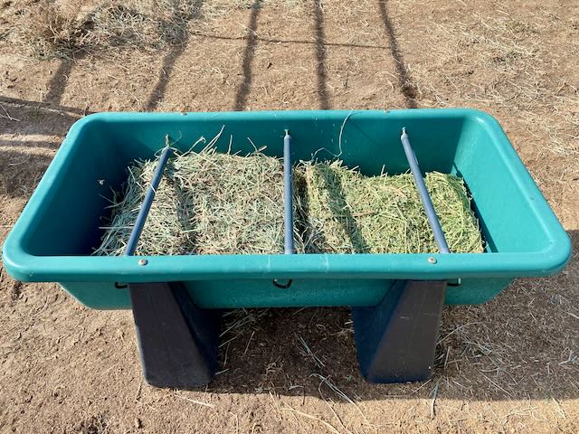 Homemade horse hay feeder to reduce waste